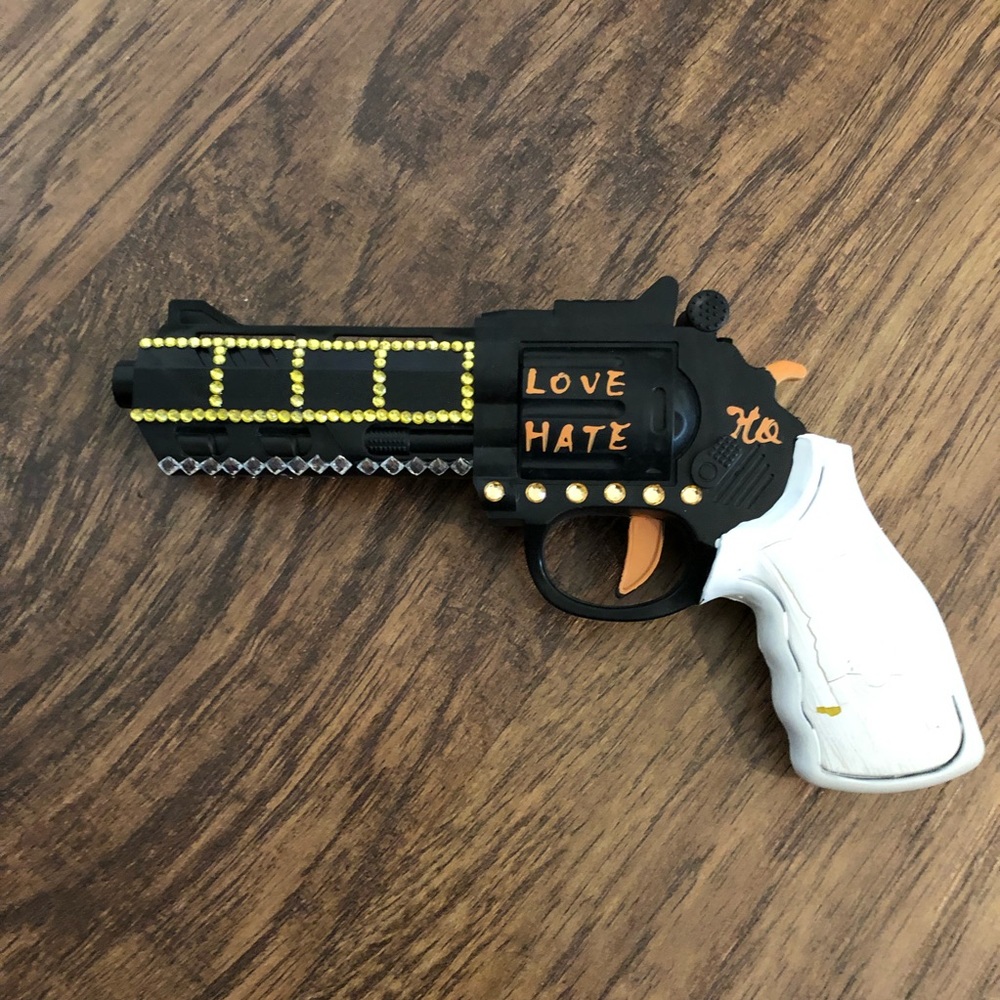Harley Quinn toy gun prop with defects